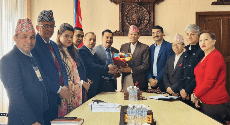 Minister Sharma with NRNA