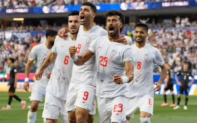 Iran opens its politically charged World Cup by playing to a 2-2 draw with New Zealand