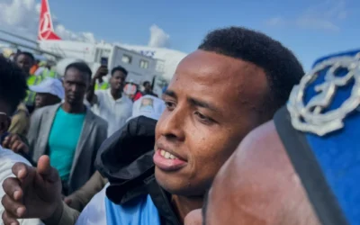 Somali soccer referee denied entry to US for World Cup is welcomed home as a hero 